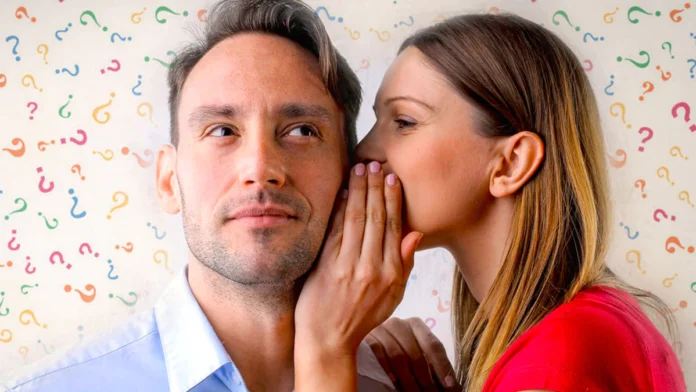 Woman Whispering questions to man partner