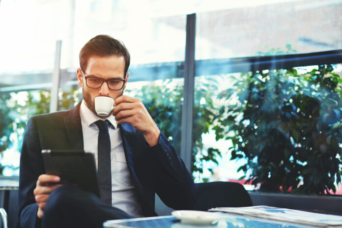 business man watching tablet