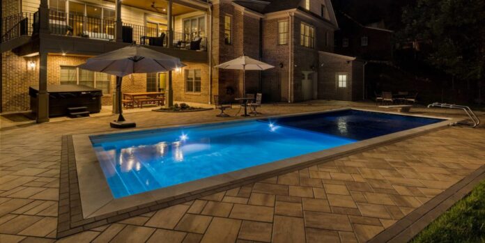 fiberglass pool in home yard scaled