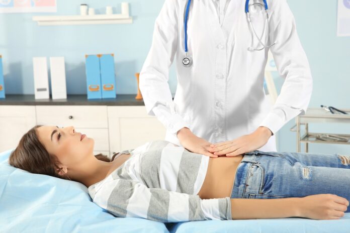 young woman at gynecology appointment.jpg.optimal